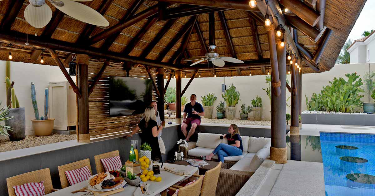 Transform Your Backyard into a Luxurious Tropical Retreat with a Cape Reed Thatched Gazebo