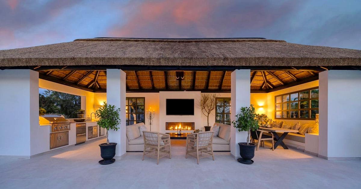 Traditional Cape Reed craftsmanship creating a serene garden sanctuary in Spain.