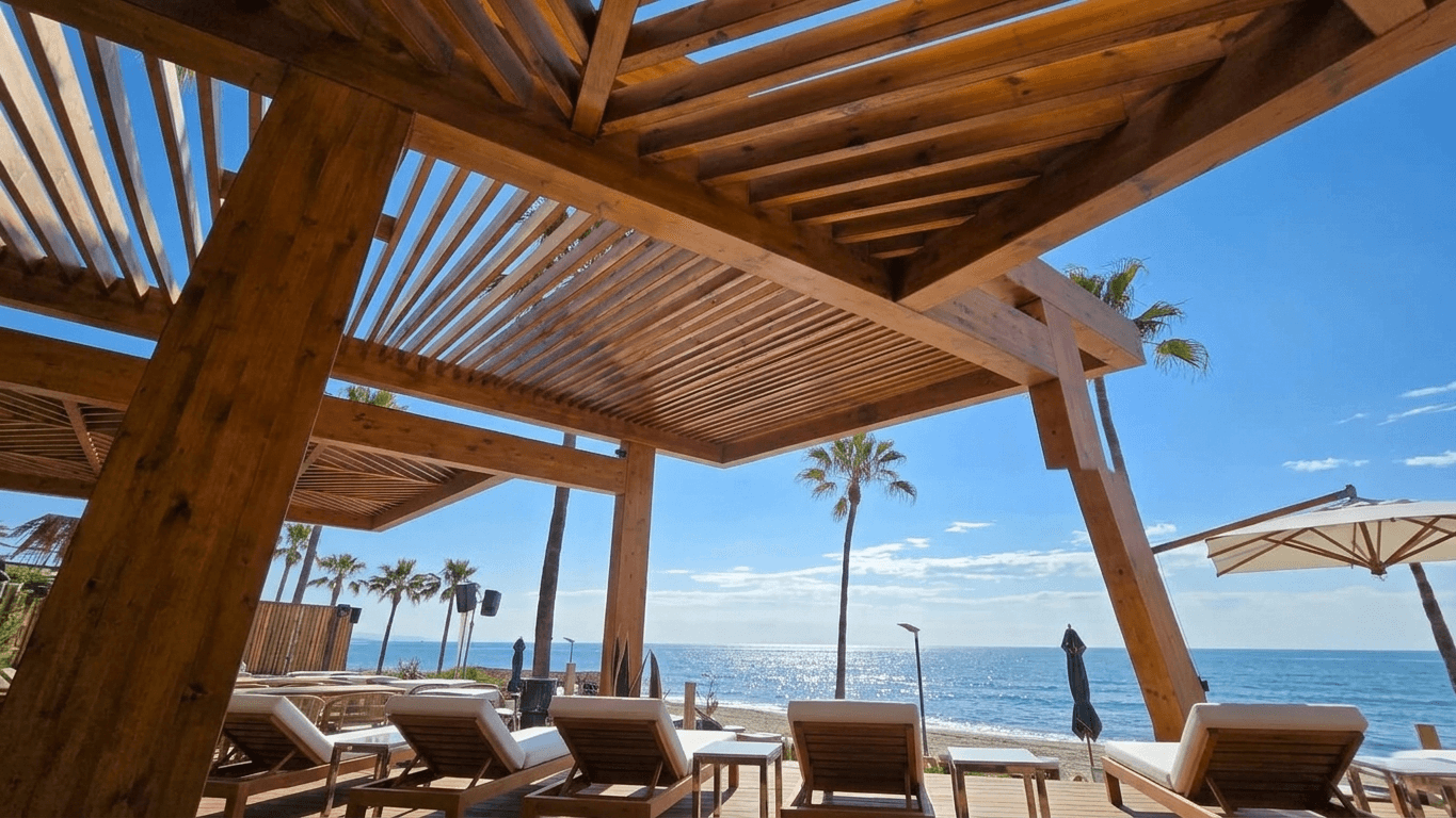 Cape Reed square laminated timber structure at Laguna Beach Resort, Estepona.